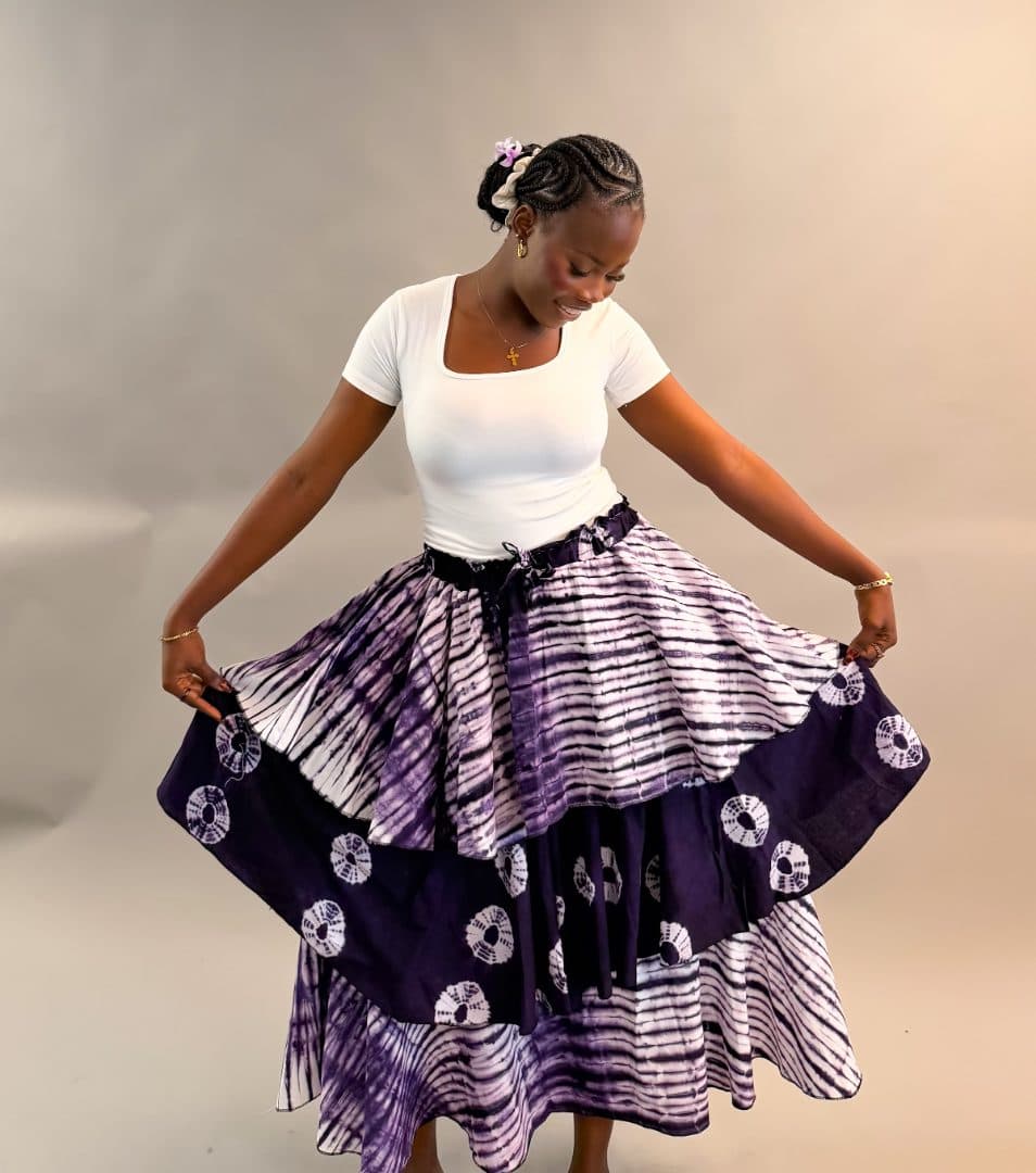 Model wearing the Adire Layered Skirt in purple