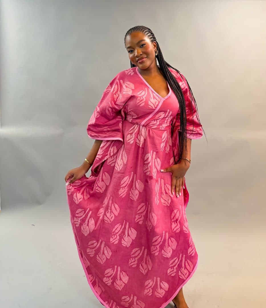Model wearing the Adire Maxi Dress in pink