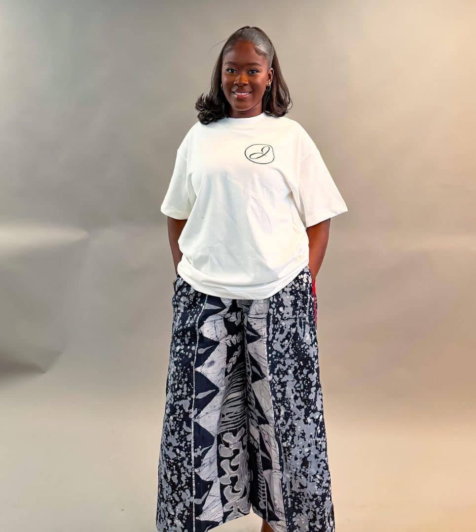 Model wearing the Midi Pants in black and white